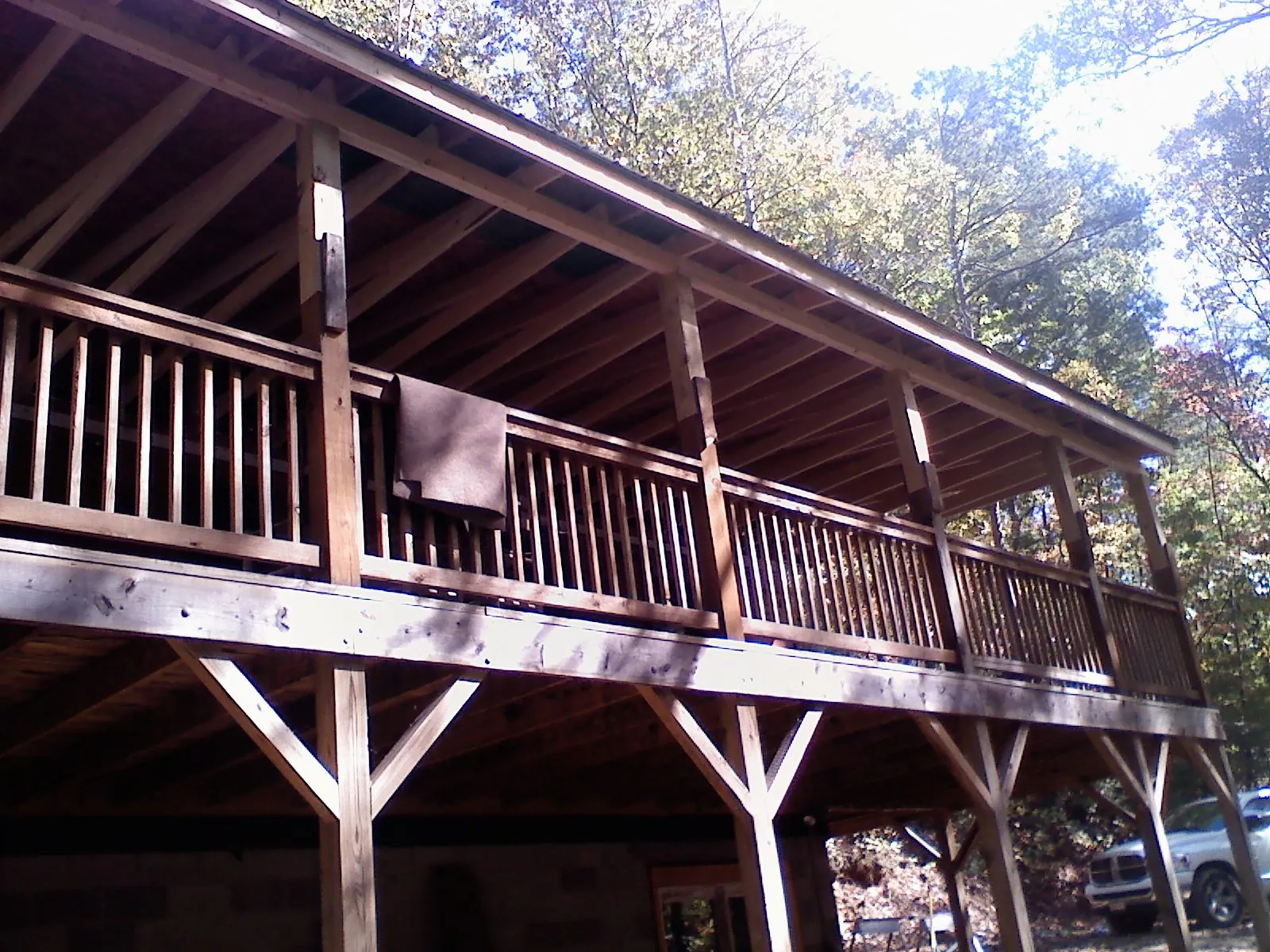 Timber framing under a new elevated porch and deck — Roof Leak Repair in Fort Scott by Roofing Brothers